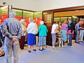 People viewing exhibition at inside the Church