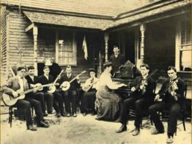 Black and white image of olden days group of musicians