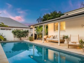 Shutters at Byron - Byron Bay - Pool and Outdoor Seating at Sunset