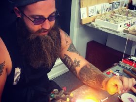 Student learning the Art of Lampworking