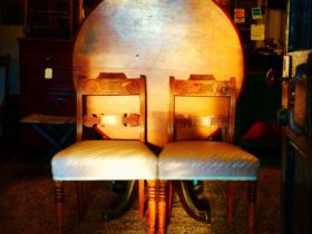 A pair of Mahogany Regency chairs with a Colonial Australian Cedar tilt top table.