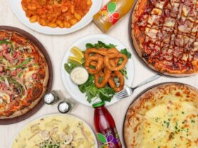 Dishes filled with Pizza, Gnocchi, spaghetti and Calamari