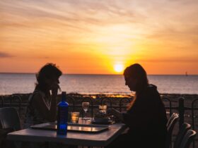 Photo of couple dining at the Darwin Ski Club at sunset