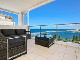 Balcony view from Tower one penthouse. Bulcock Beach and Bribie Island Coastline.