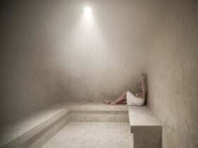 Woman relaxing in spacious steam room