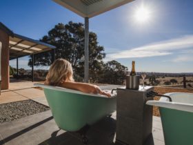 Soak away life's stresses in the outdoor bubble baths with views right across the valley