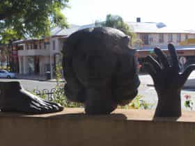 Head, foot and hand statue
