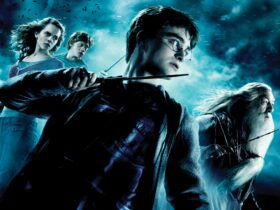 3 wizard students and their headmaster hold wands facing to the right on a dark and stormy backdrop