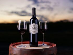 Sunset, barrel & wine glasses