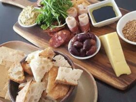 Fresh Produce Plate including olives, cheese, dip, chorizo, prosciutto, sticky balsamic, dukkha and