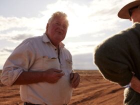 Outback Mail Man telling a story about the outback to his guest.