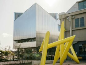 UTAS inversek campus building with Yellow triangular sculpture