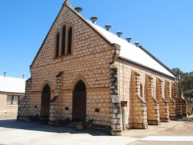 External photo of limestone church