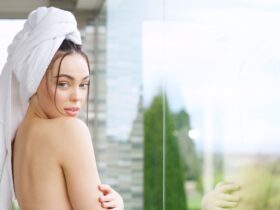 Woman wearing hair wrapped in a towel