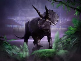 A grey animated Triceratops in the flagged with green trees and leaves with a purple back