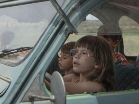 image from movie, children driving a car