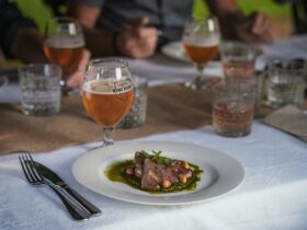 Table setting of main meal-lamb with belgian tripel beer