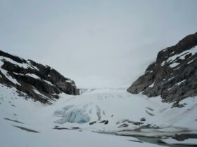 Video still of the base of a glacial face in Norway