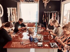 Shanyn Linklater Jewellery workshop attendees working at their pieces around a large table