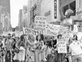 Women protesting during the 1970s in Melbourne. One of the signs reads 'dress for comfort no style'.