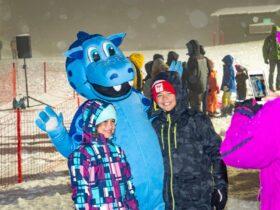 Pete the Snowdragon enjoy the snow at Falls Creek with kids