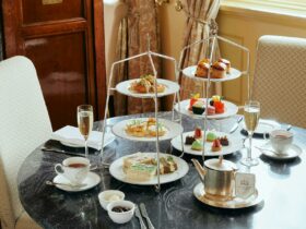 Two Afternoon Tea Cake Stands with Champagne and Tea