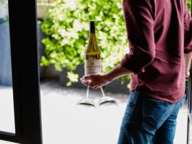 A Giant Steps Chardonnay being tasted in the courtyard.