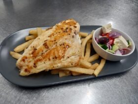 Plate of Grilled Fish and Chips with Greek Salad served at the Gascoyne Junction Pub and Tourist Par