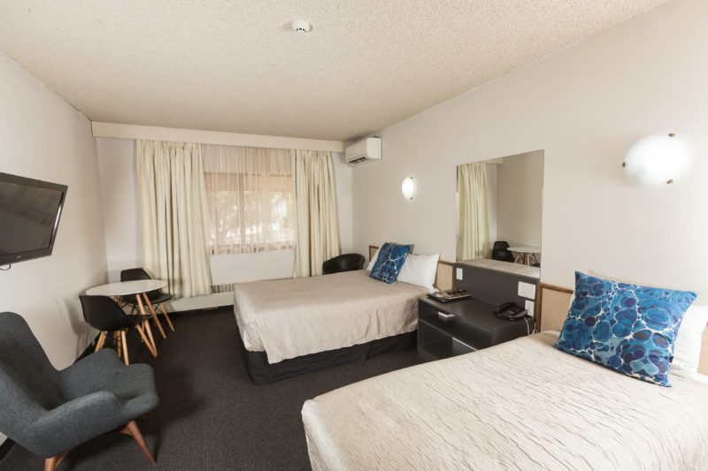 Our classic hotel room is a comfortable sized room with a queen & single bed