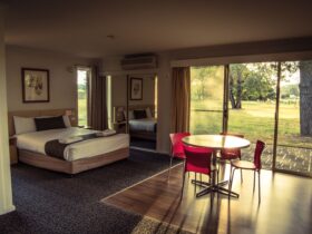 Yowani Country Club motel room interior with views of the golf course