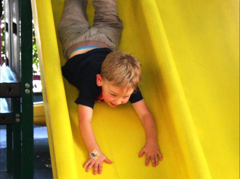Small boy on the slide
