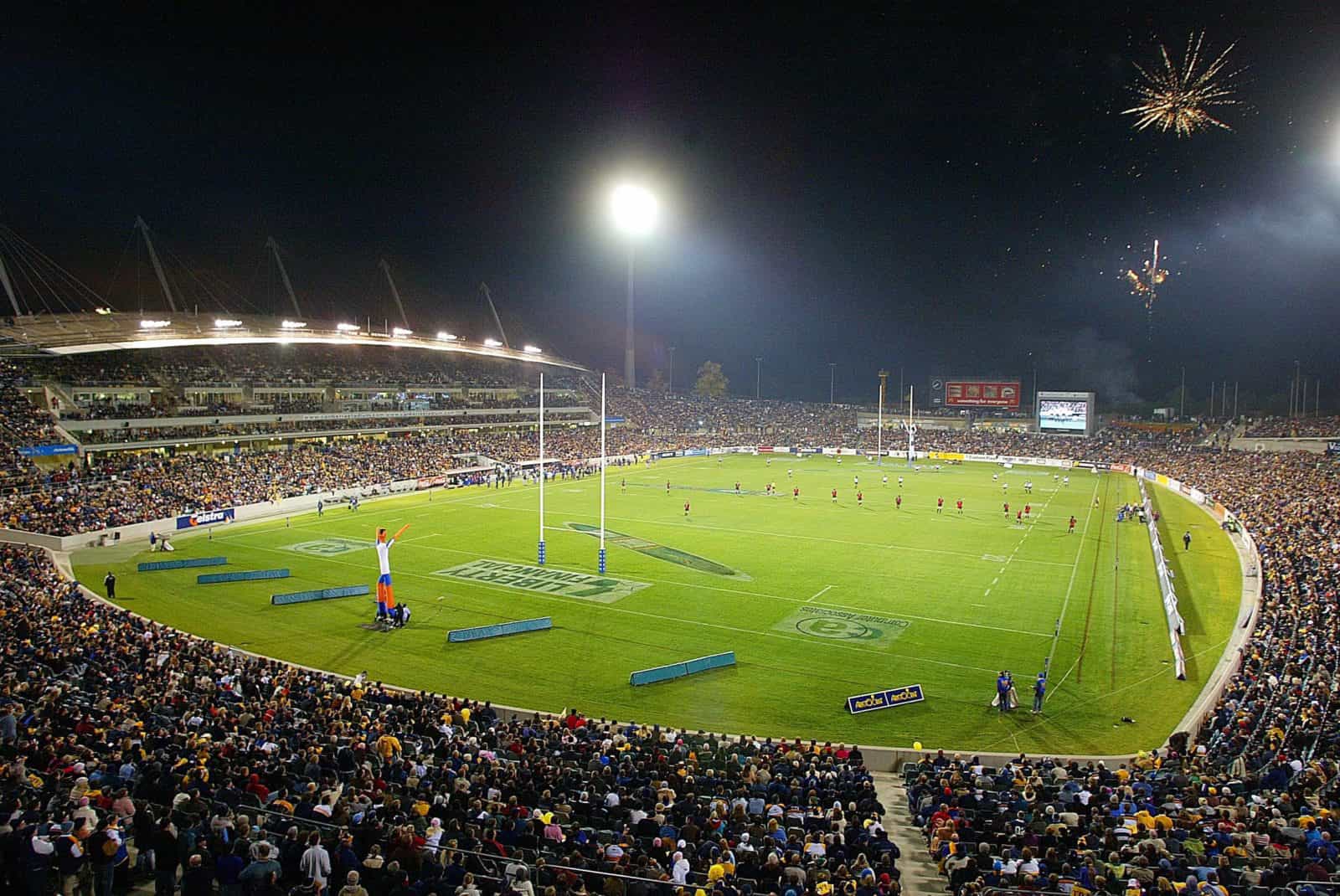 A packed stadium at night