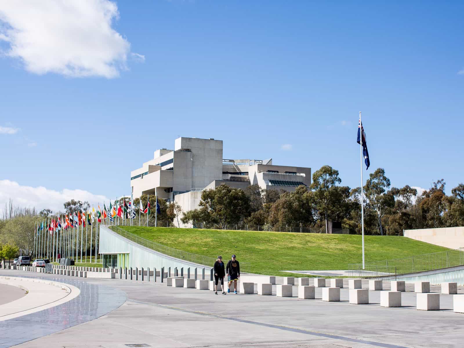 International Flag Display with the High Court of Australia in the background