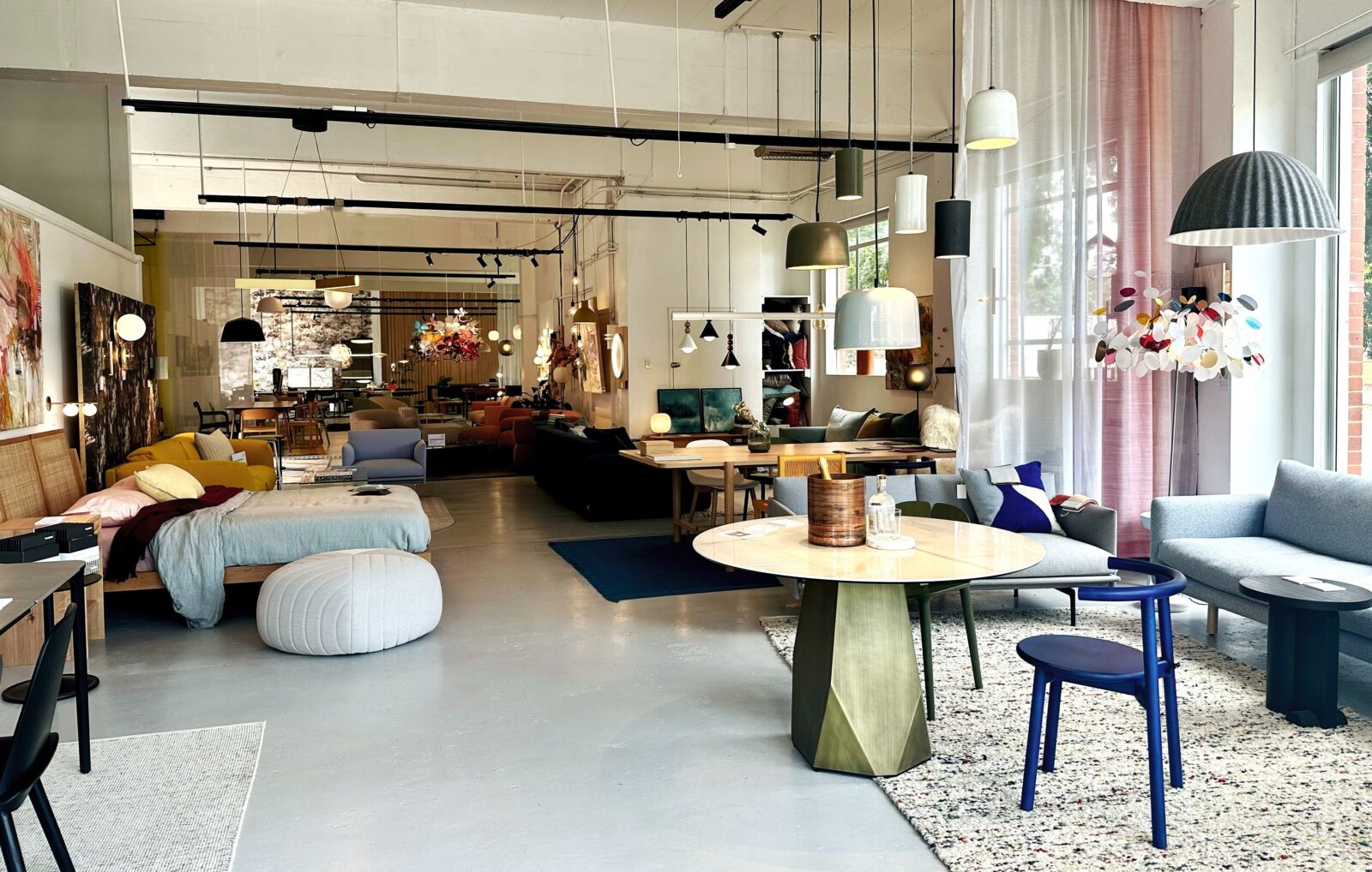 Image of Miko showroom, featuting furniture, lighting and rugs.