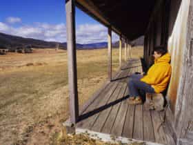 Hiker resting at Orroral Homestead