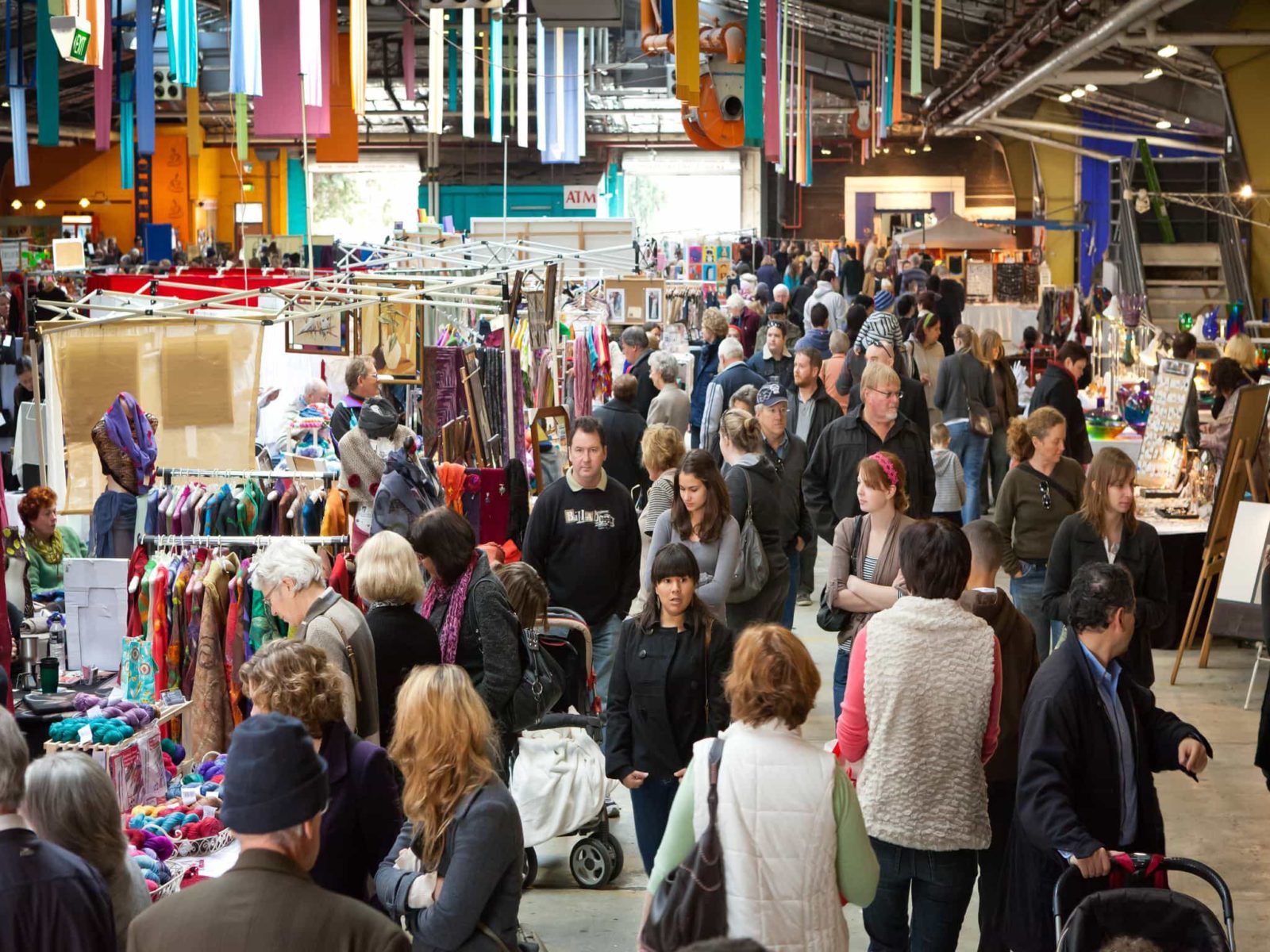 The hustle and bustle of visitors of stallholders at the Old Bus Depot Markets
