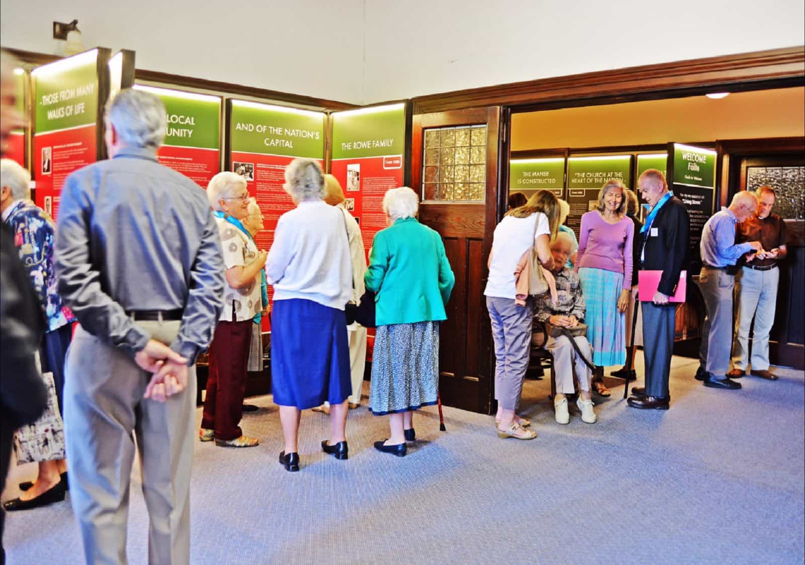 People viewing exhibition at inside the Church