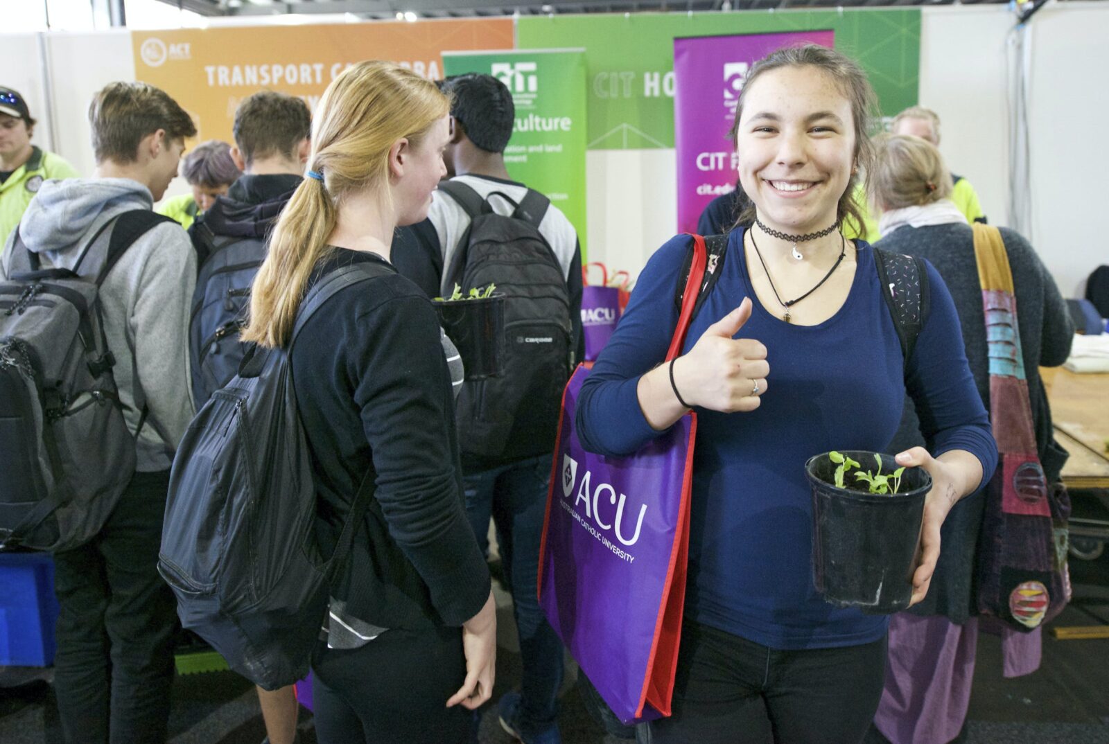 Student visiting hte Canberra Careerspo with her thumb up indicating that it was a great experience.
