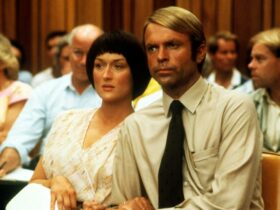 Still from Evil Angels showing a man and a woman in a courtroom