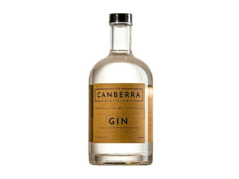 A single bottle of clear coloured gin with a label 'The Canberra Distillery' gin