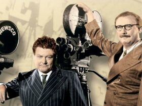 Promotional image for Newsfront showing two men with news camera equipment