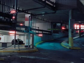 Image of a parking lot entrance at night, taken by James Harber