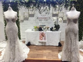 Beautiful gowns at Annabel's Bridal Studio display at Your Local Wedding Guide Canberra Expo