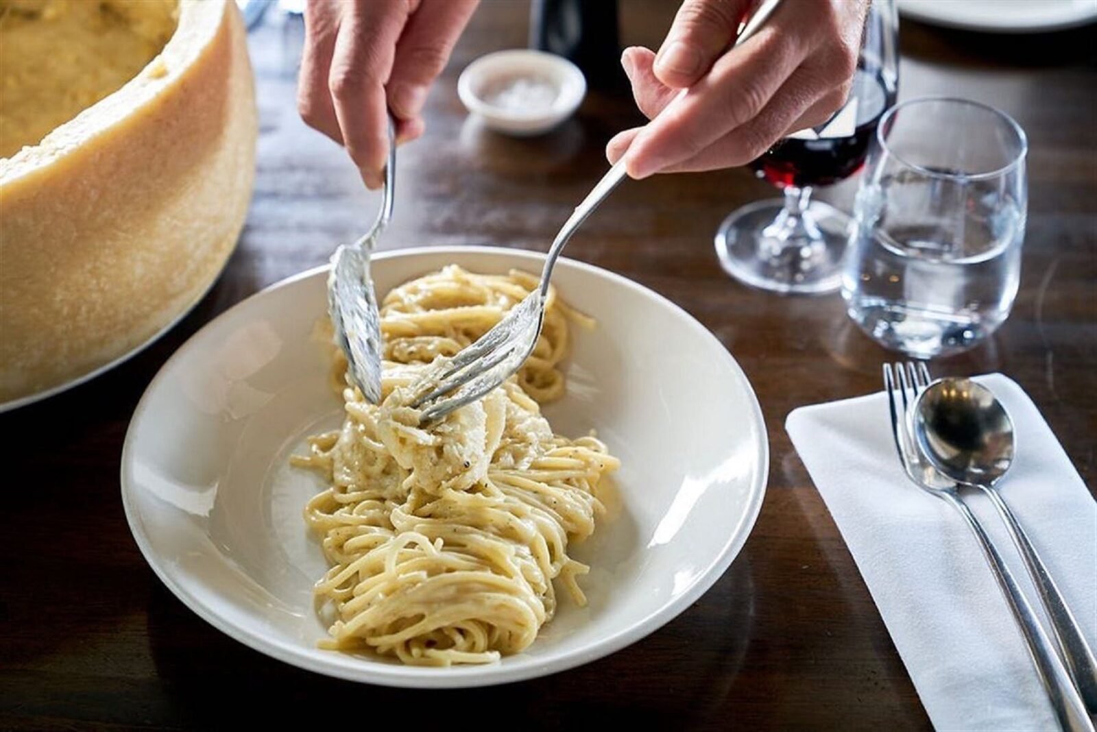 Plate of spaghetti on restaurant table