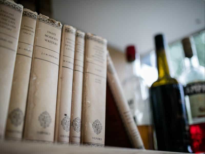 Books and bottles of alcohol