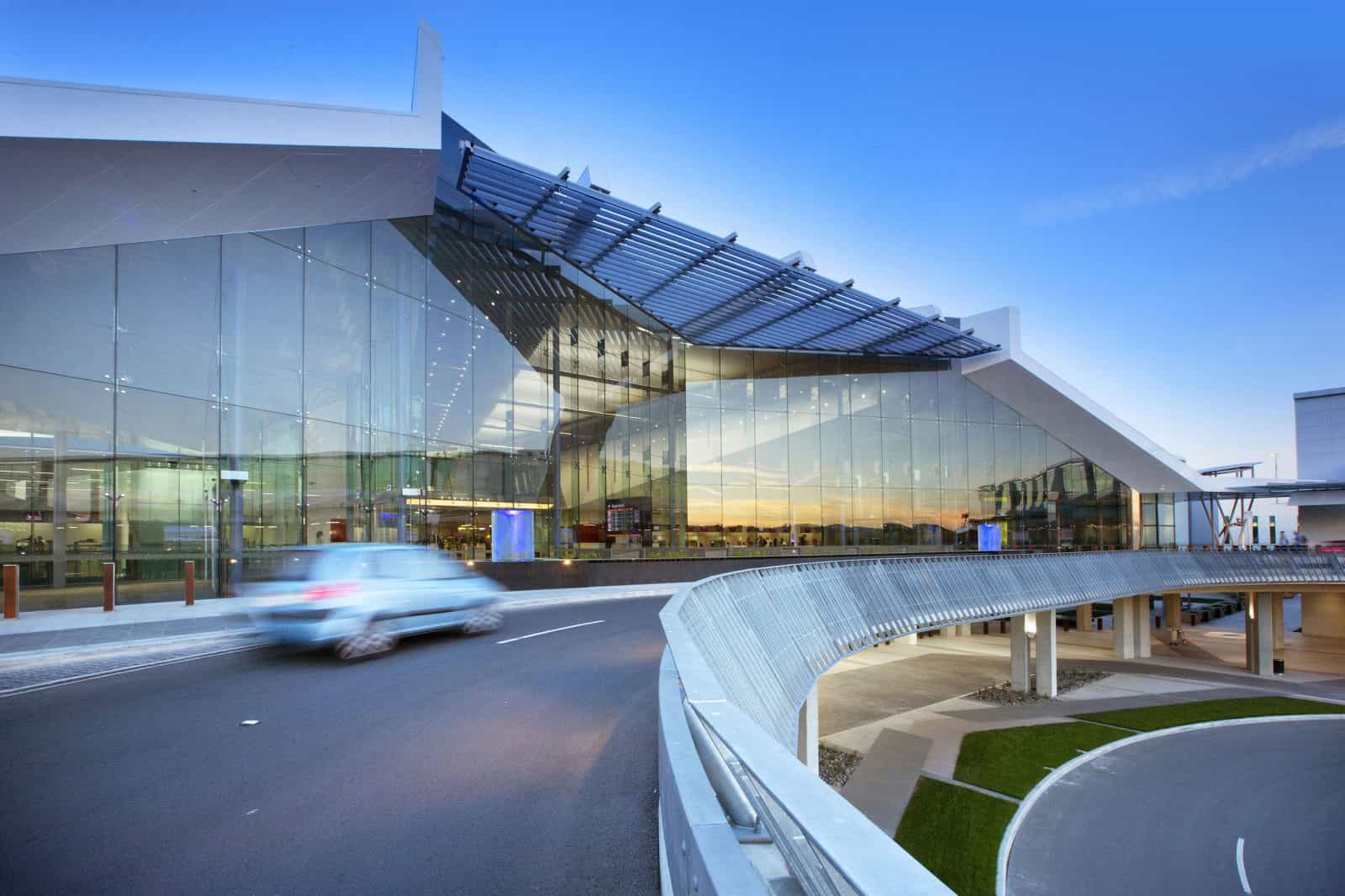 Modern glass exterior of the airport terminal