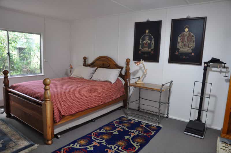 Queen size bed at your Nelligen accommodation