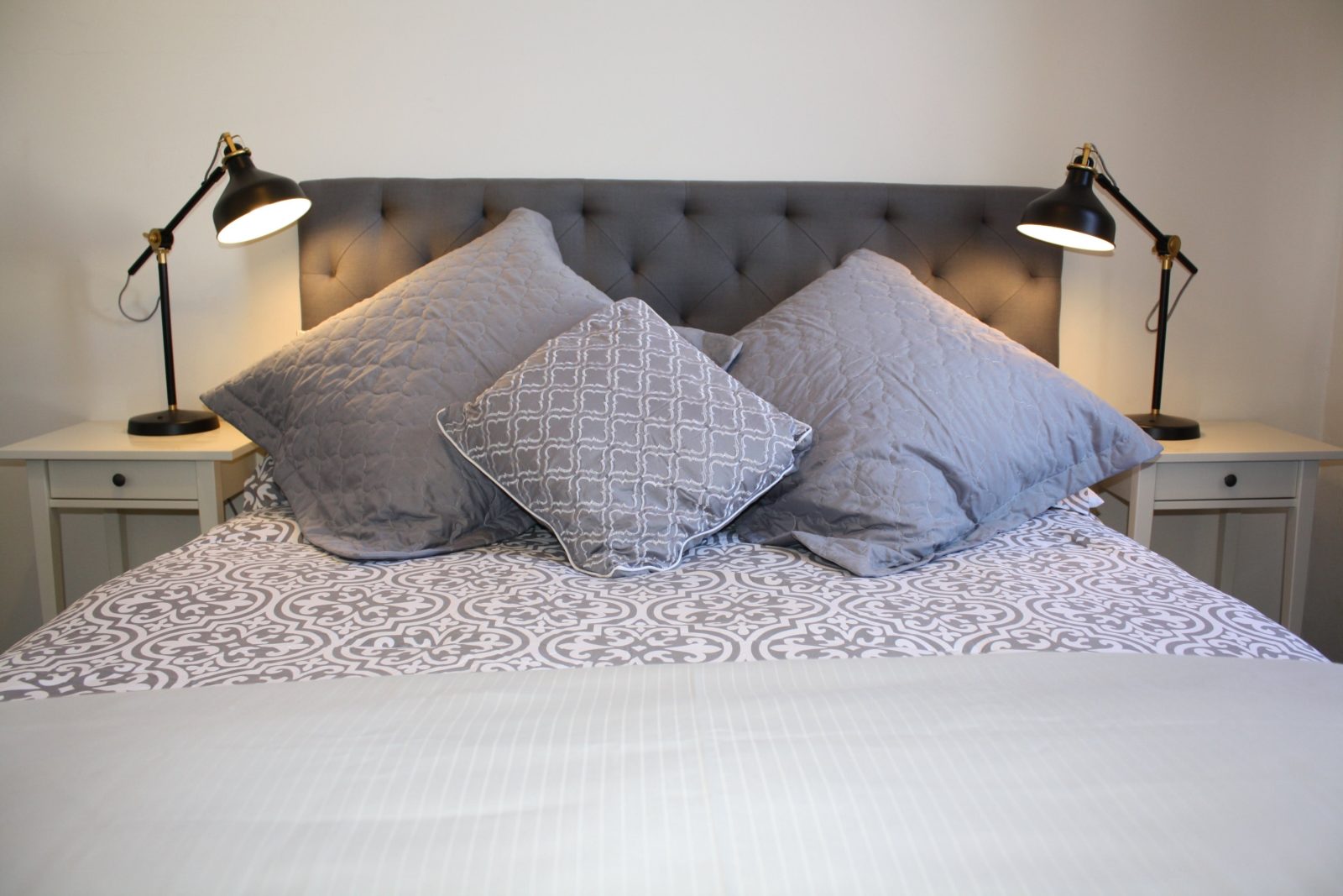 Bed with luxury cushions and linen