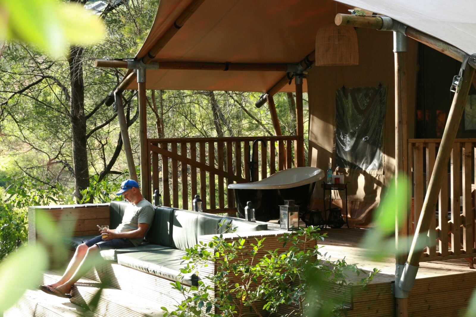 Relaxing on the deck of one of the tented lodges at Ding Dang Doo Ranch