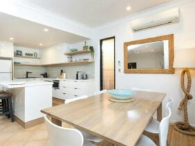 Kitchen and dining with air-conditioning and coastal decor